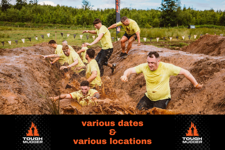 People clambering through a very muddy and challenging course.