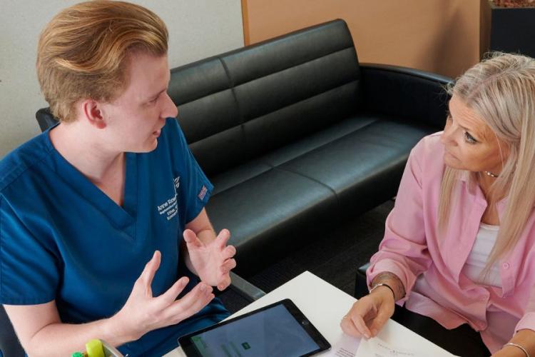 Researcher and research participant in the Anne Rowling Clinic reception area