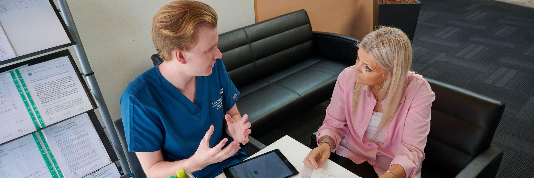 Researcher and research participant in the Anne Rowling Clinic reception area