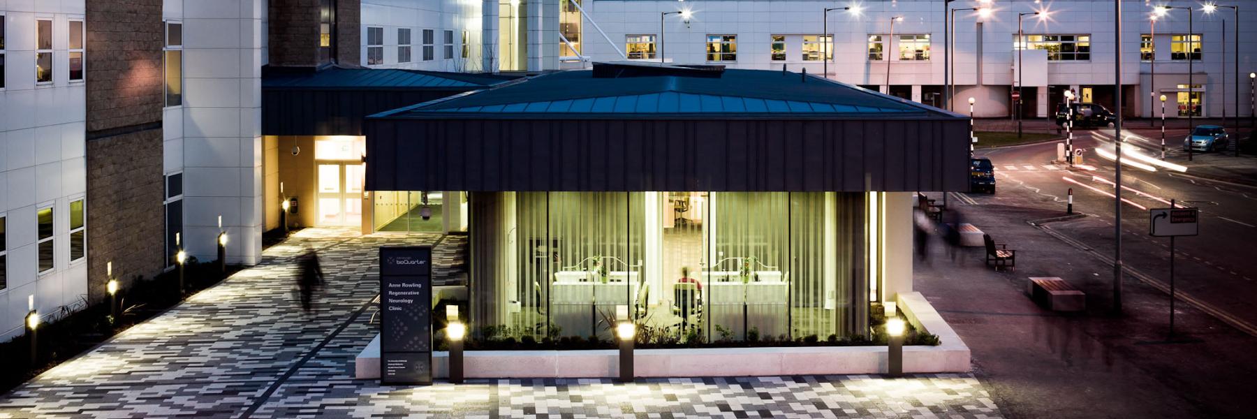 A photo of the back entrance of Anne Rowling Clinic at night