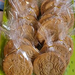 A picture of scientific cookies on an Anne Rowling Clinic green serving dish