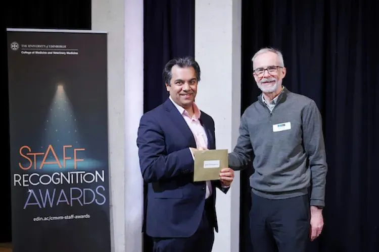 (Left of picture) Professor Suvankar Pal receiving CMVM Staff Recognition Award for Student Experience together with Martin Denvir (right of picture)